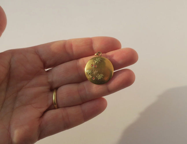 Pendentif Pendentif ancien porte-bonheur houx en or rose 18 carats 58 Facettes