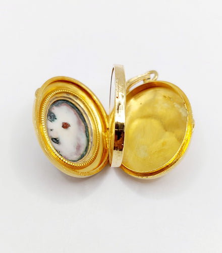 Pendentif Pendentif porte-photo or jaune miniature demoiselle (circa 1920) 58 Facettes A05939