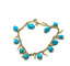 Geelgouden armband met turquoise kralen en decoratieve bedels 