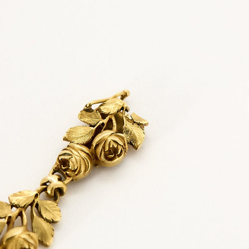 Bracelet Bracelet en or jaune à motif de fleurs et de feuilles ciselées 58 Facettes MON1100X2