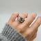 Bague 53 Bague or blanc sertie d’un saphir jaune et diamants 58 Facettes