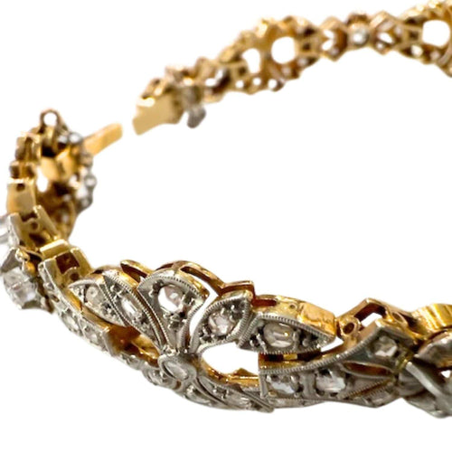 Bracelet Bracelet design Art Déco en or jaune et platine avec diamants 58 Facettes Q315B