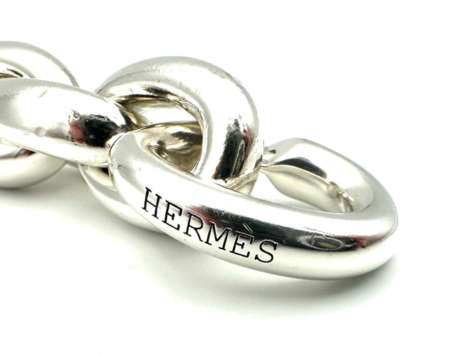 Bracelet HERMES. Collection "Acrobate", bracelet argent GM 58 Facettes