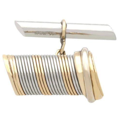 Boutons de manchette Boutons de manchettes Cartier or et acier 58 Facettes