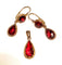 Boucles d'oreilles Parure pendentif et boucles d’oreilles en or jaune, grenat, vers 1850 58 Facettes AB640