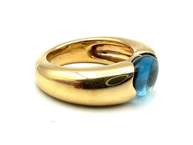 POMELLATO. Collection "Sassi", bague or jaune et topaze bleue 58 Facettes