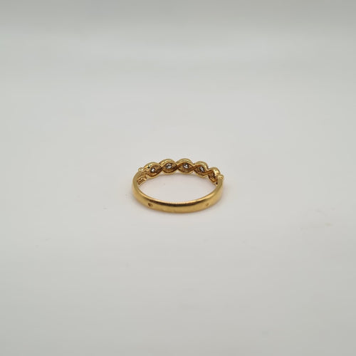 Bague 55 Demi-alliance or jaune 18 carats sertie de diamants 58 Facettes