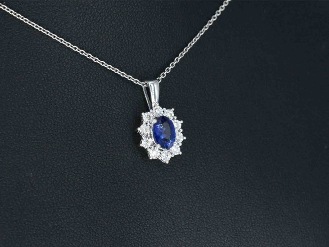 White gold entourage pendant with diamonds and sapphire 58 Facettes 2299