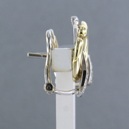 Boucles d'oreilles Boucles d'oreilles bicolores en or serties de diamants taille brillant 58 Facettes