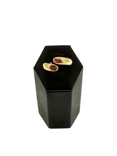 Cartier - Ellipsring i gult guld Två korslagda huvuden med rubiner