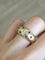 Bague 51 Bague boule en or jaune, diamant, rubis, saphirs, émeraudes 58 Facettes