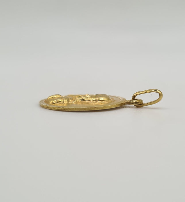 Yellow gold religious pendant