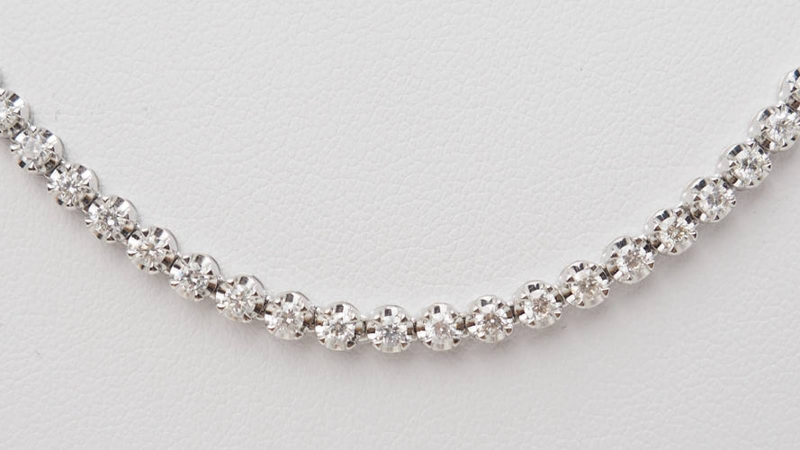 Collier 44.5 Collier rivière en or blanc et diamants 58 Facettes 32532