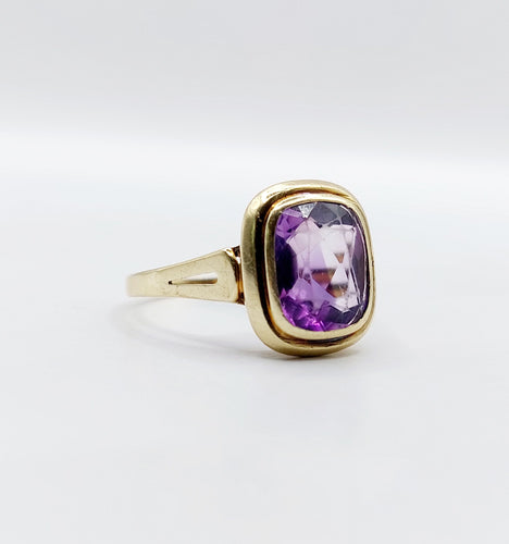 Bague 60 Bague cocktail vintage or jaune améthyste de 2,30 carats sertis clos (circa 1970) 58 Facettes A05476