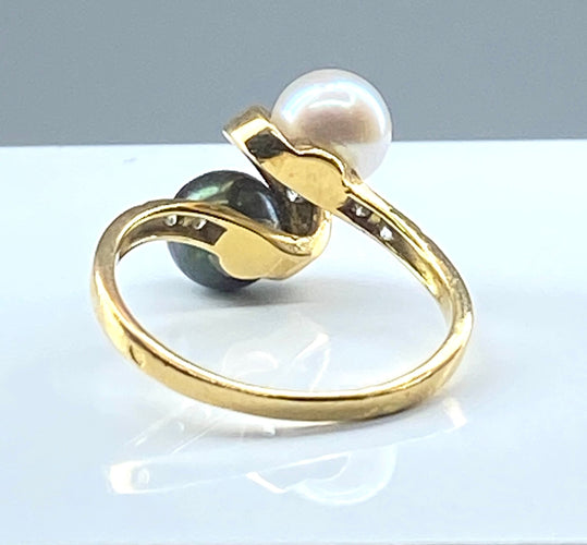 Bague Bague en or jaune 18 carats, perle de Tahiti, perle de culture blanche et diamants 58 Facettes AB264