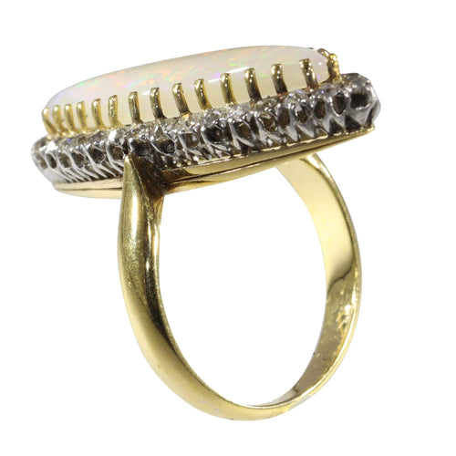 Bague 55 L'élégance victorienne : le chef-d'œuvre de la bague en opale et diamant de 1880 58 Facettes 16054-0031
