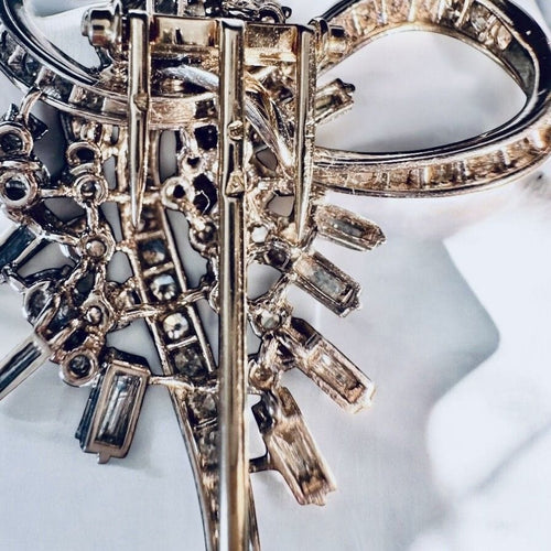 Broche Broche Art Déco en or gris, platine, diamants 58 Facettes