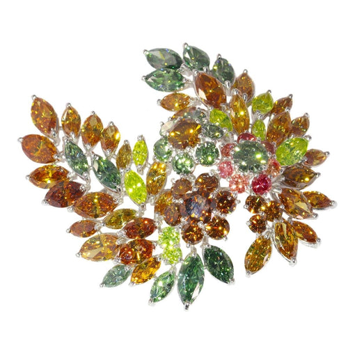 Broche Broche vintage exquise des années 1970 : une symphonie de plus de 19 carats de diamants de couleur fantaisie 58 Facettes 21092-0149