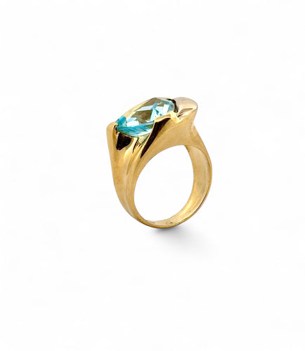 Bague Bague en or jaune 18 carats et topaze bleue 58 Facettes