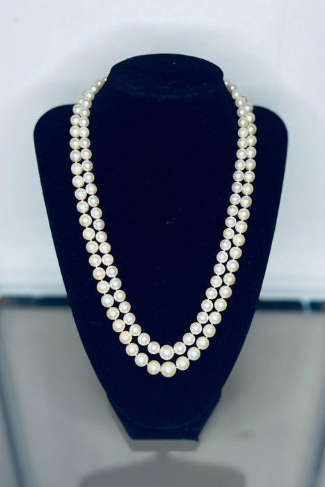 Superb double row necklace 124 cultured pearls gold and diamond clasp