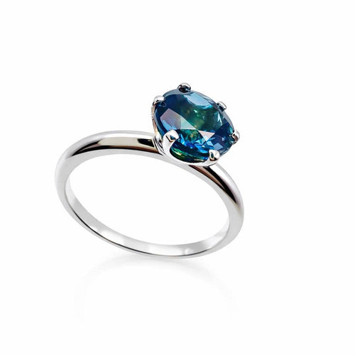 Tektaş beyaz altın ve merkezi topaz ile, Londra tarzı 