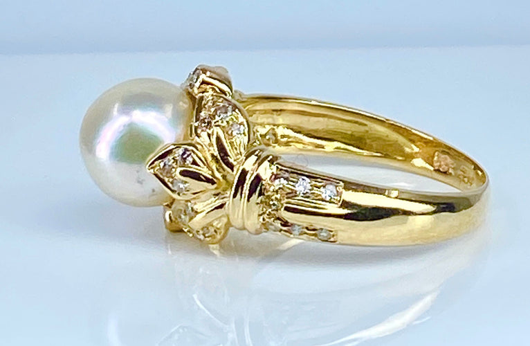 Bague 52 Bague en or jaune 18 carats, perle et 38 diamants 58 Facettes AB448