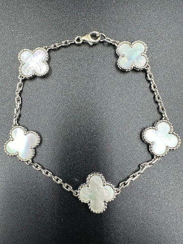 Bracelet VAN CLEEF & ARPELS. Collection "Alhambra Vintage", bracelet or blanc 18K et nacre 58 Facettes