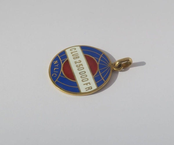 Pendentif Pendentif ancien globe terrestre New York Life insurance Company émail 58 Facettes