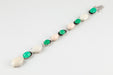 Bracelet Bracelet or gris serti de corail blanc et de chrysoprases 58 Facettes 175307