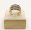 Bague 55.5 Bague Bandeau or jaune sertie de saphirs, émeraudes, rubis et diamants 58 Facettes
