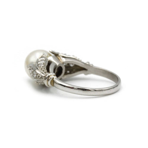 Bague 52 Bague or, diamants et perle 58 Facettes 1150