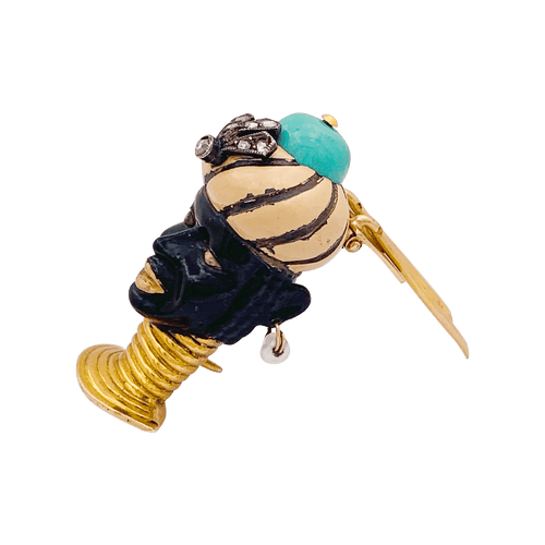 Broche Broche ancienne Cartier, "Tête de Maure", or jaune, argent, émail, diamants, turquoise. 58 Facettes 34520