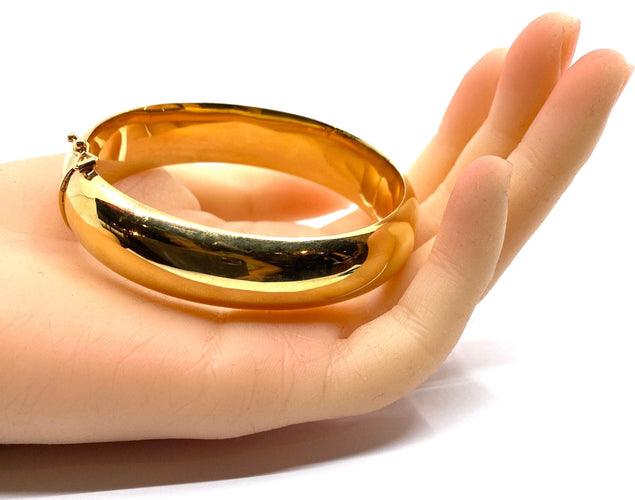 Bracelet Bracelet jonc en or 18 carats ouvrant, modèle lisse. 58 Facettes