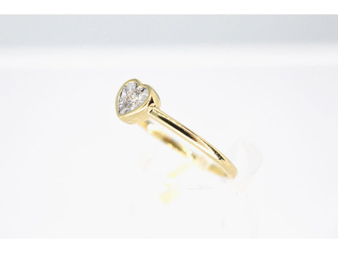 Bague Bague en or avec un diamant taille brillant en forme de coeur 58 Facettes 2097