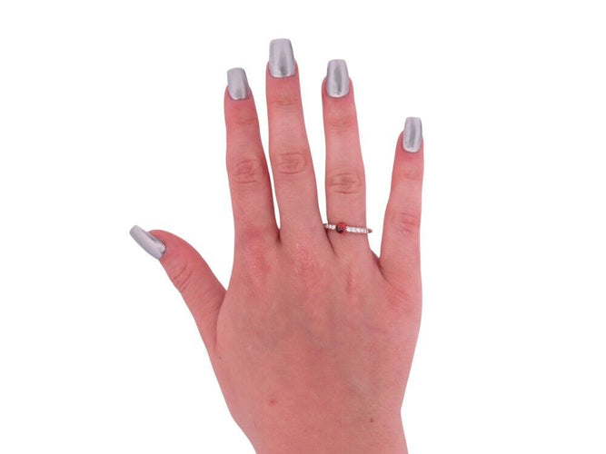 Bague 53 bague POMELLATO m'ama non m'ama grenat 53 diamants or jaune 18k 58 Facettes 268365