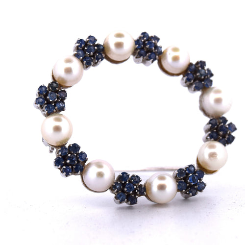 Broche Broche en or blanc, perles naturelles et saphirs 58 Facettes