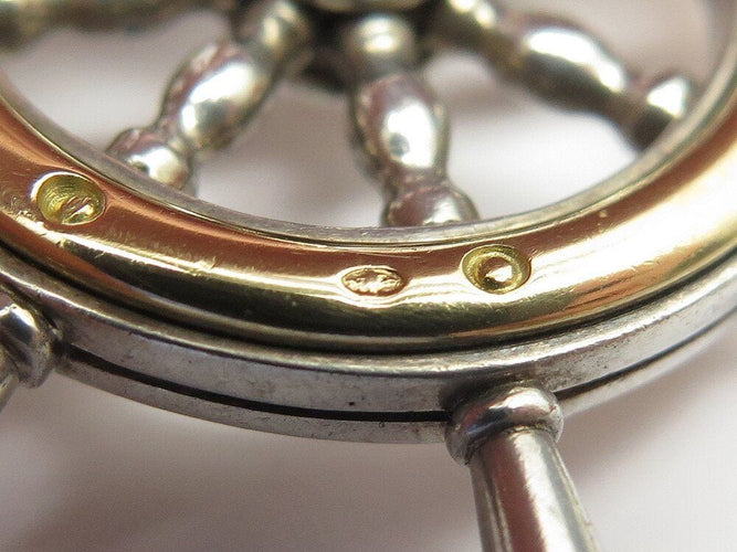 Pendentif rare vintage pendentif HERMES barre a roue en argent 800 & or jaune 18k 24.8 gr 58 Facettes 268491