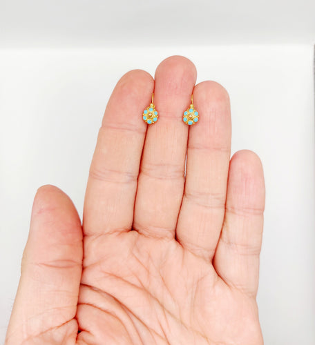 Boucles d'oreilles Boucles d’oreilles dormeuses fleur émail bleu en or 18k 58 Facettes A06471