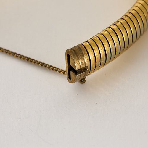 Bracelet Bracelet articulé en or jaune à maille tubogas 58 Facettes NAR01282