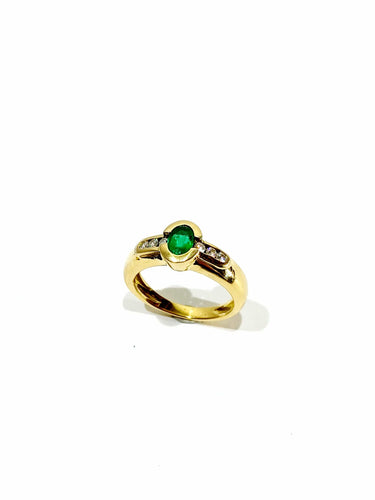 Bague 51 Bague or jaune, émeraude et diamants 58 Facettes