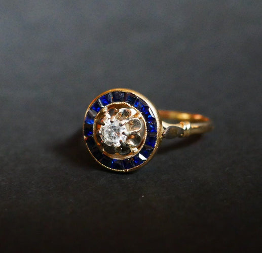 Bague 55.5 Bague ornée d'un Diamant, entourage de Saphirs calibrés 58 Facettes C49-02