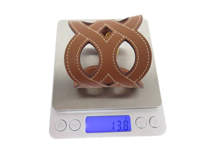 Bracelet bracelet HERMES manchette entrelacs cuir swift h081205cc37t2 16-17cm 58 Facettes 266719