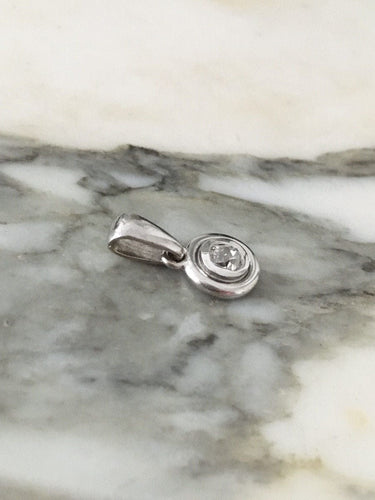 Pendentif Pendentif en or blanc serti d’un diamant 58 Facettes