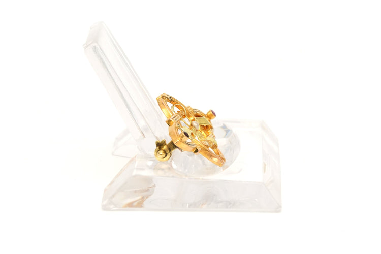 Broche Broche Art Nouveau en or jaune sertie d'une perle et de rubis 58 Facettes 22963