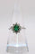 Ring Daisy in white gold adorned with an emerald and diamonds 