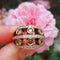 Bague 53 Bague boule "Vulcania" - diamants cognac et blancs, or rose - Epoque moderne 58 Facettes 207
