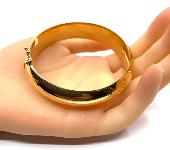 Bracelet Bracelet jonc en or 18 carats ouvrant, modèle lisse. 58 Facettes