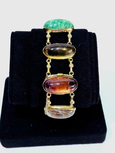 Bracelet Bracelet en or champagne 18 carats et pierres fines cabochon 58 Facettes