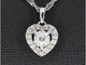 Pendentif Pendentif en or blanc avec diamants en forme de cœur 58 Facettes 2082