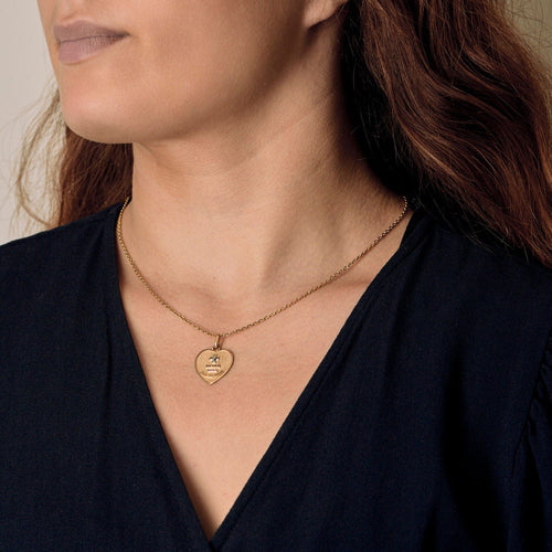 Pendentif AUGIS - Médaille d'amour, pendentif en forme de coeur en or jaune et or blanc 58 Facettes CLA0343